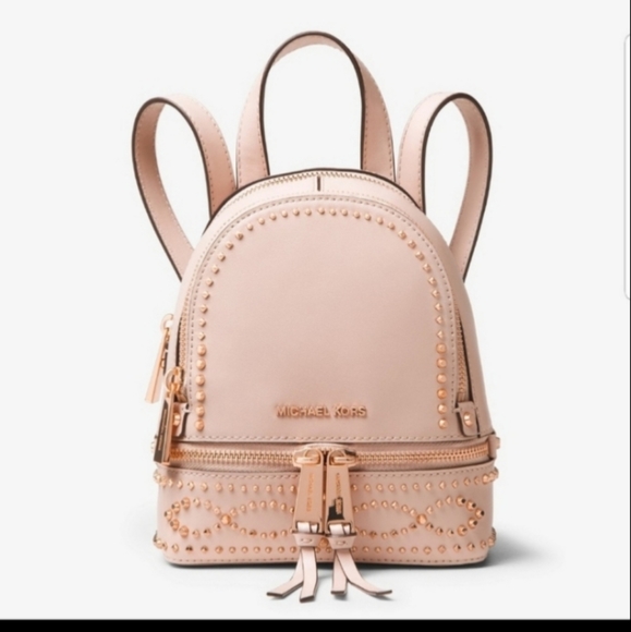 Michael Kors Handbags - Michael Kors rose gold Rhea studded backpack